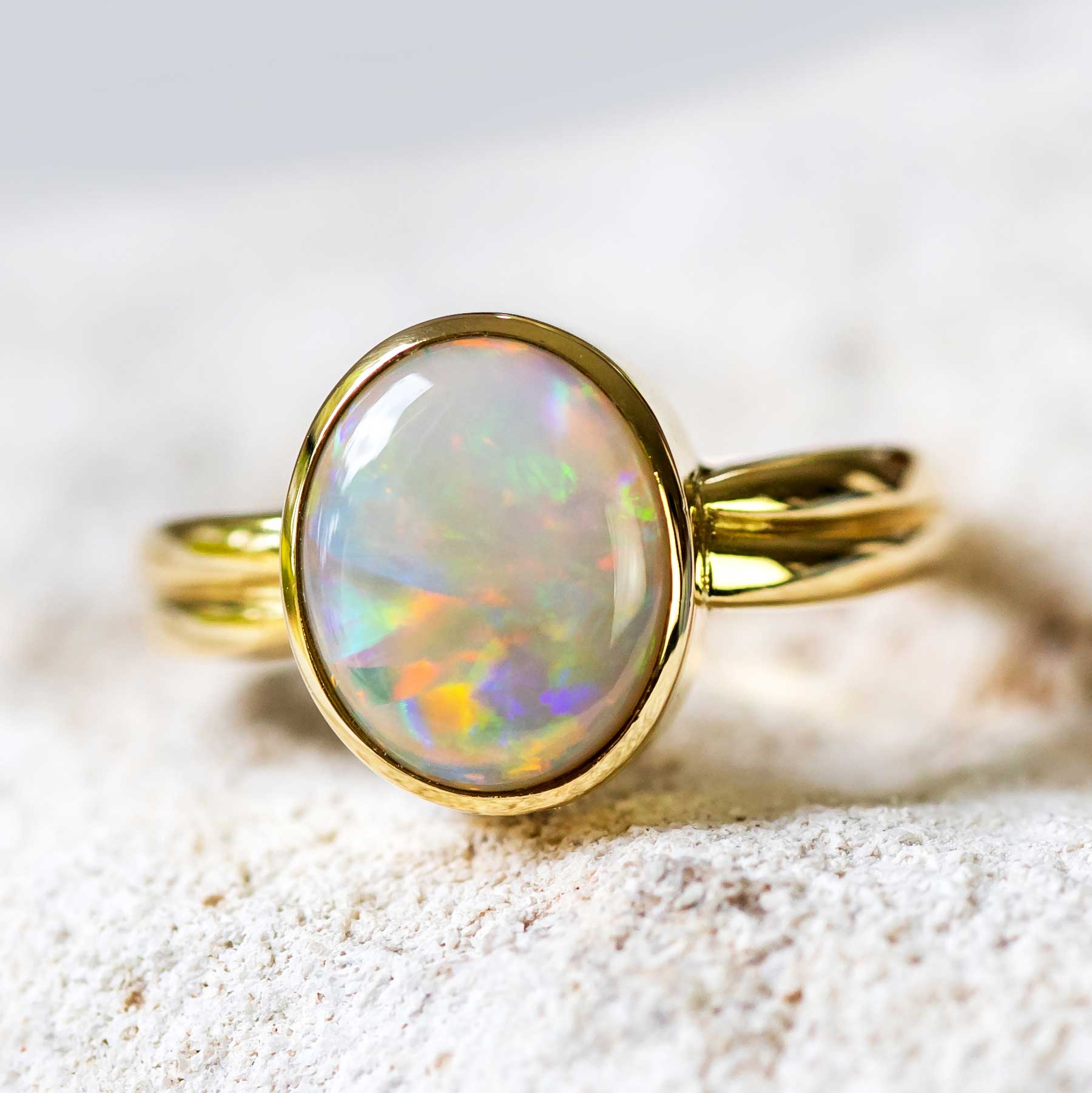 South Australian Opal Ring by Black Star Opal set into a gold bezel setting