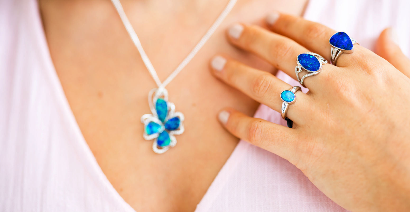 October birthstone jewellery collection of opal rings and pendant