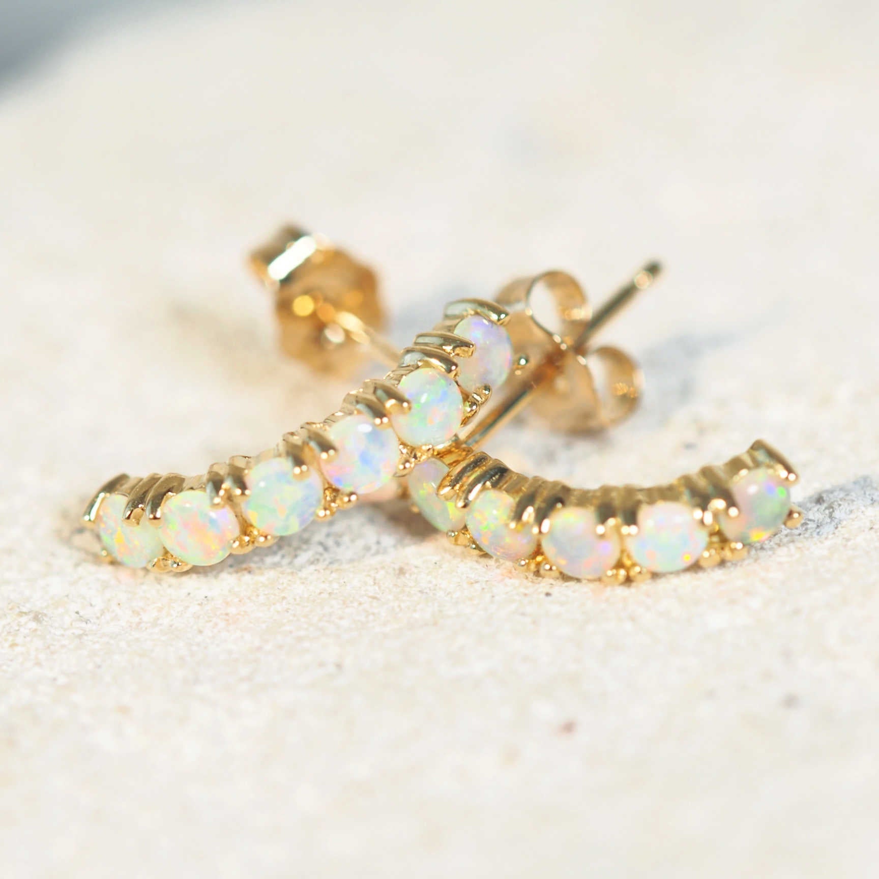 crystal opal earrings set in 18ct yellow gold