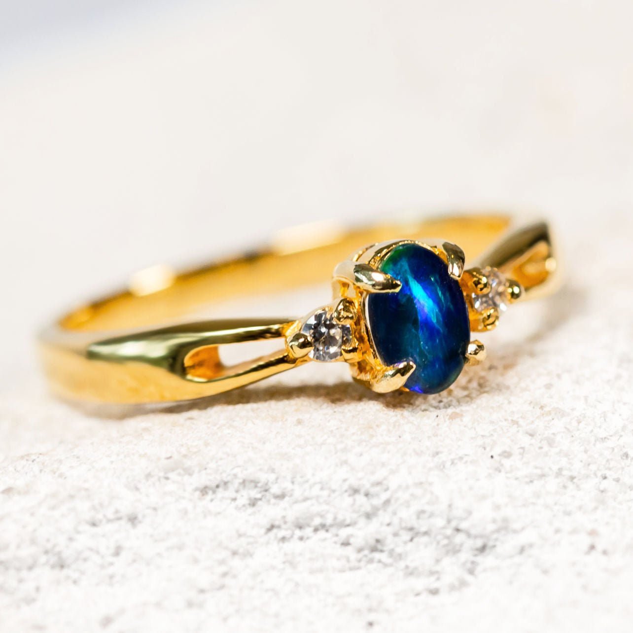 opal stone ring set in gold plated silver