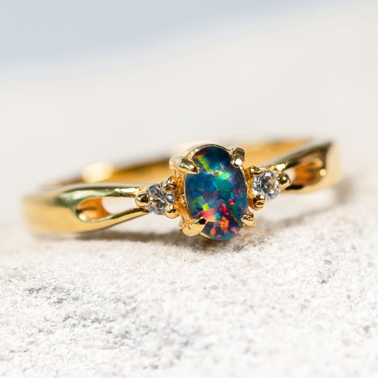 colourful opal ring set in sold plated silver with diamantes