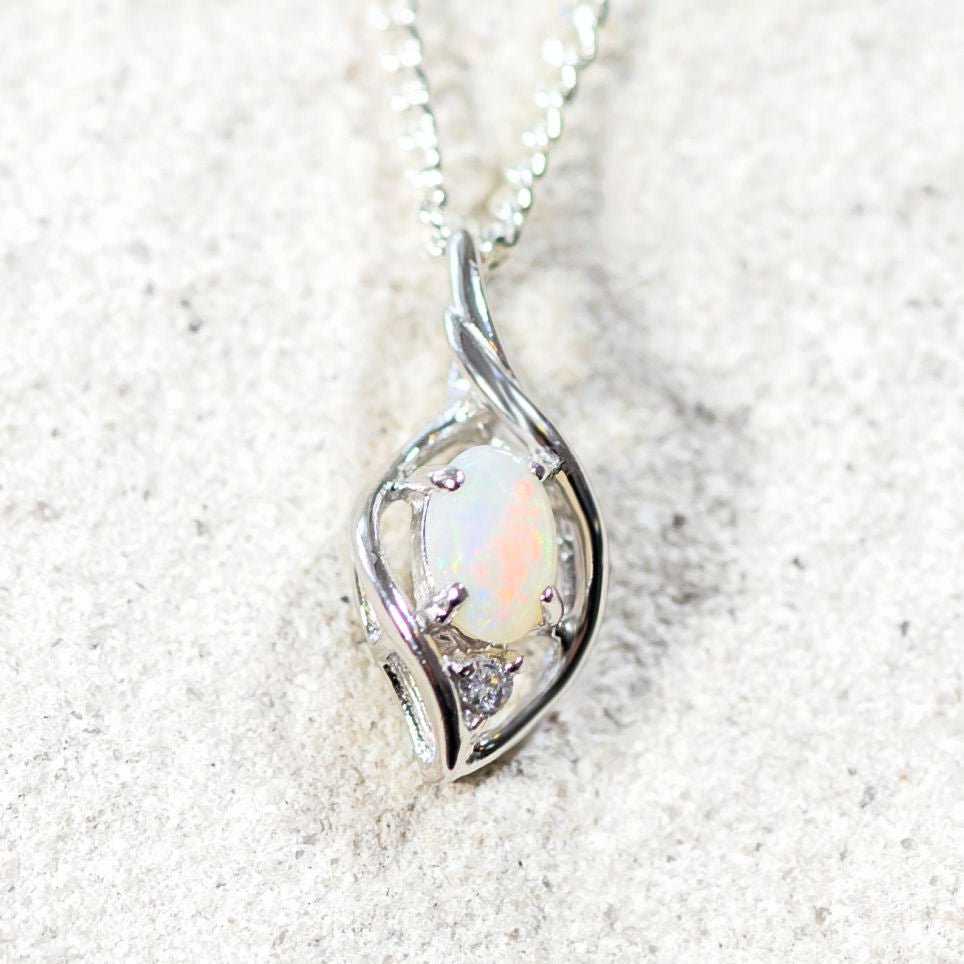 colourful delicate opal pendant in silver