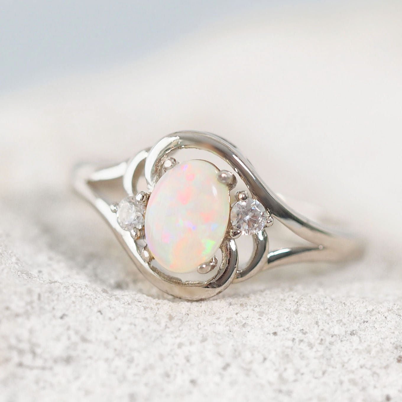 Australian white opal ring set in sterling silver with diamantes