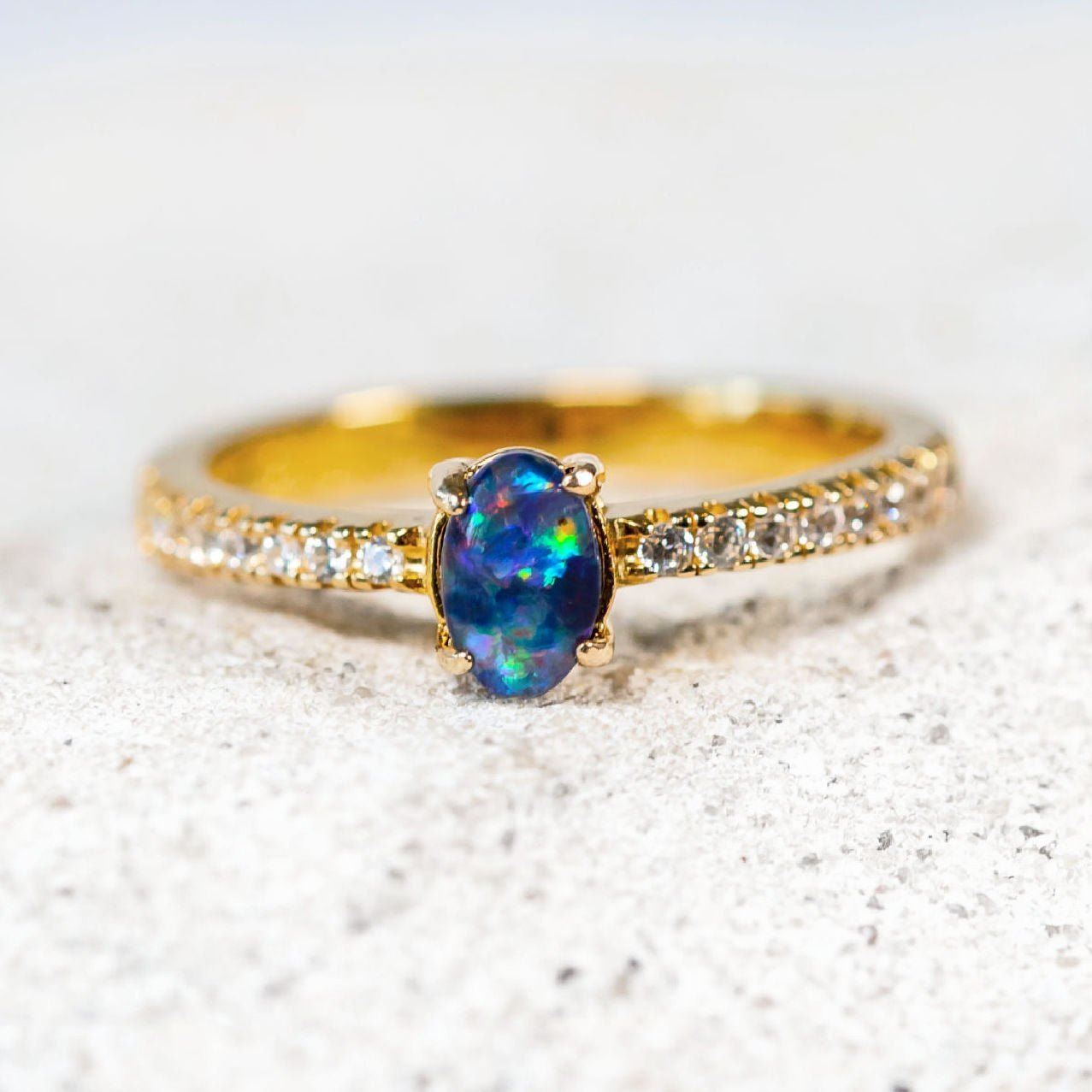 oval opal ring set in gold plated silver