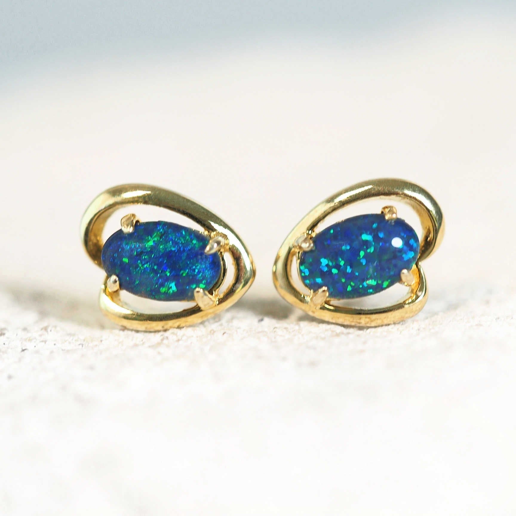 delicate opal earrings in gold plated silver