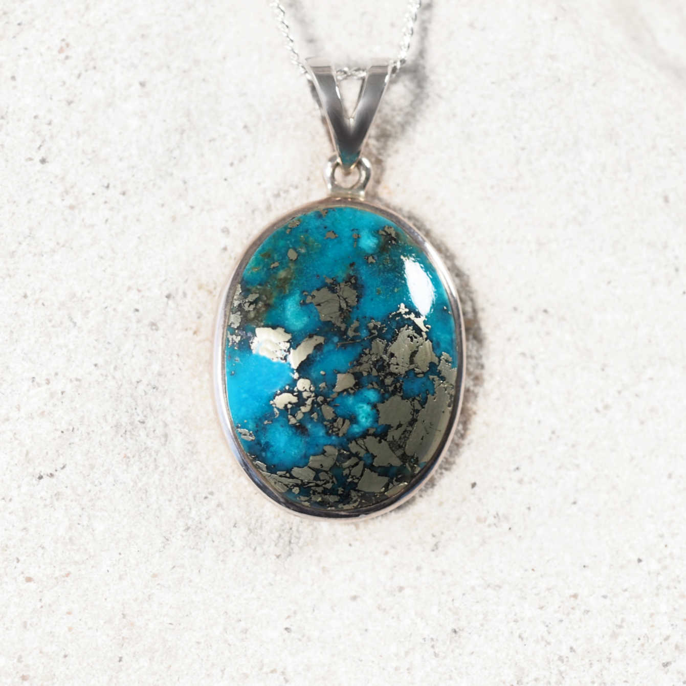 Persian Turquoise pendant with blue and grey tones