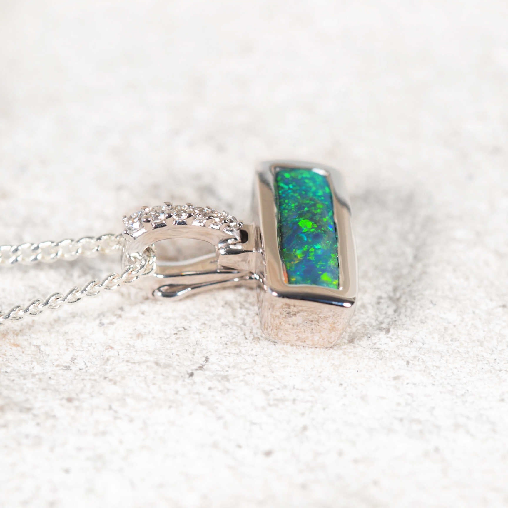 Luxury black opal and diamond pendant – handcrafted 14ct white gold necklace featuring genuine Australian opal