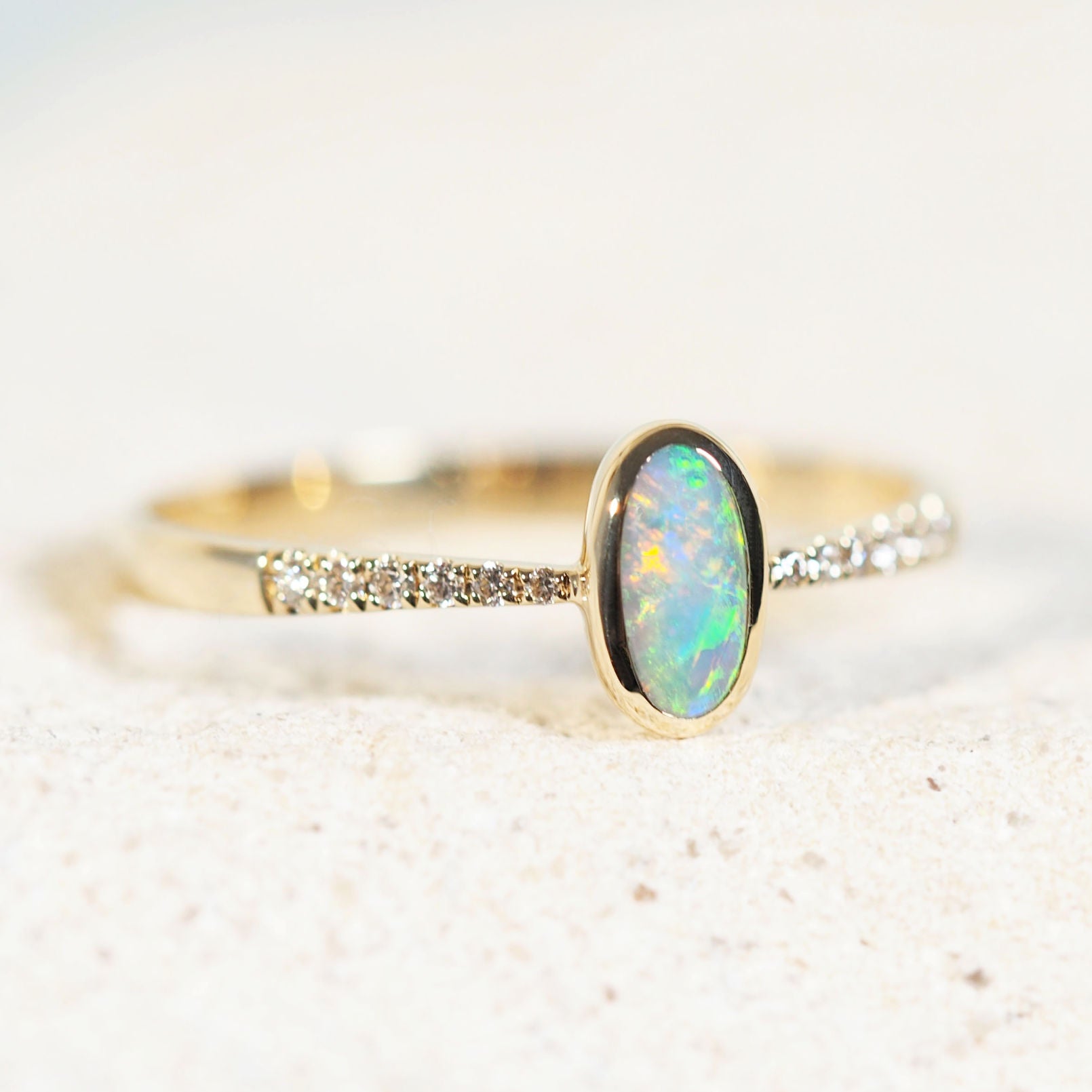 colourful black opal ring with diamonds