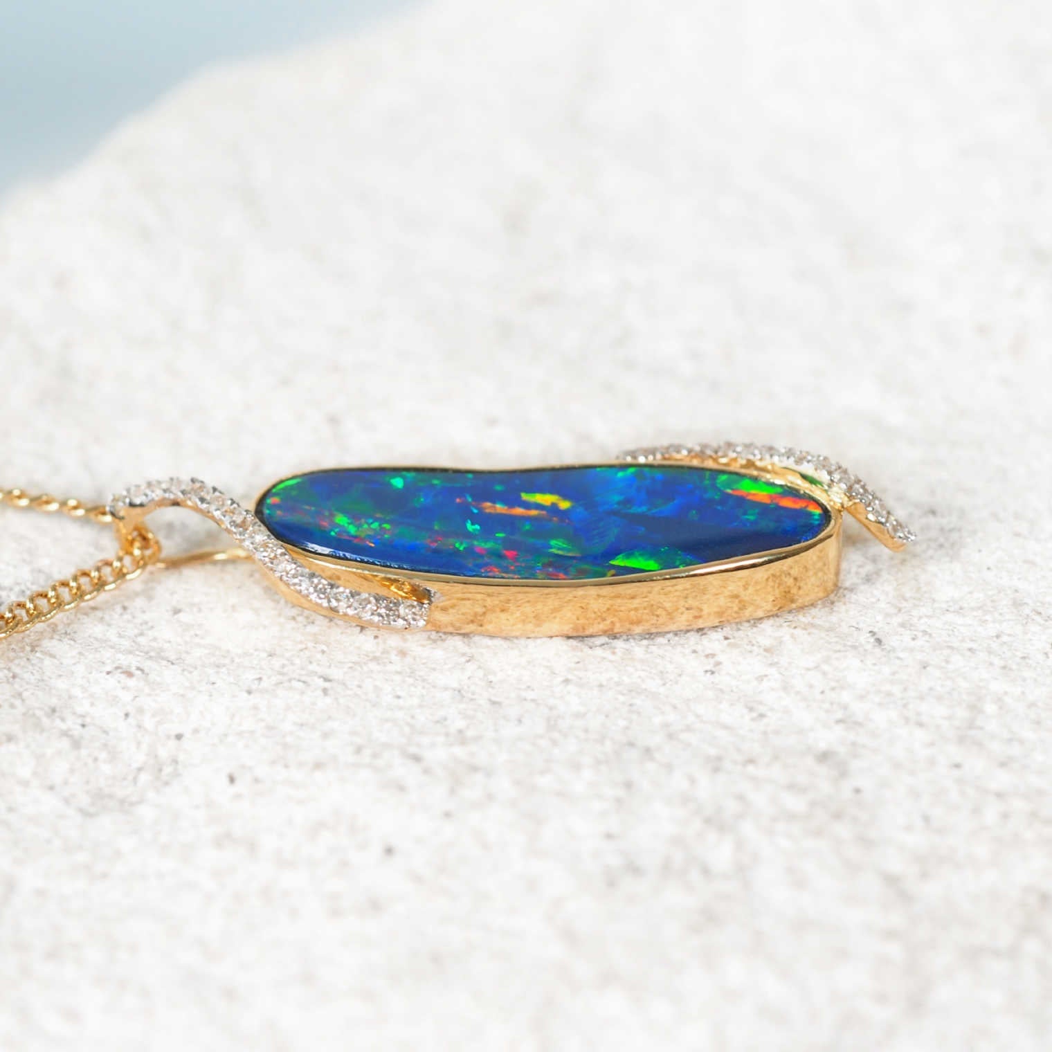 Elegant Australian opal necklace with 31 sparkling diamonds – ‘Corinne’ pendant by Black Star Opal