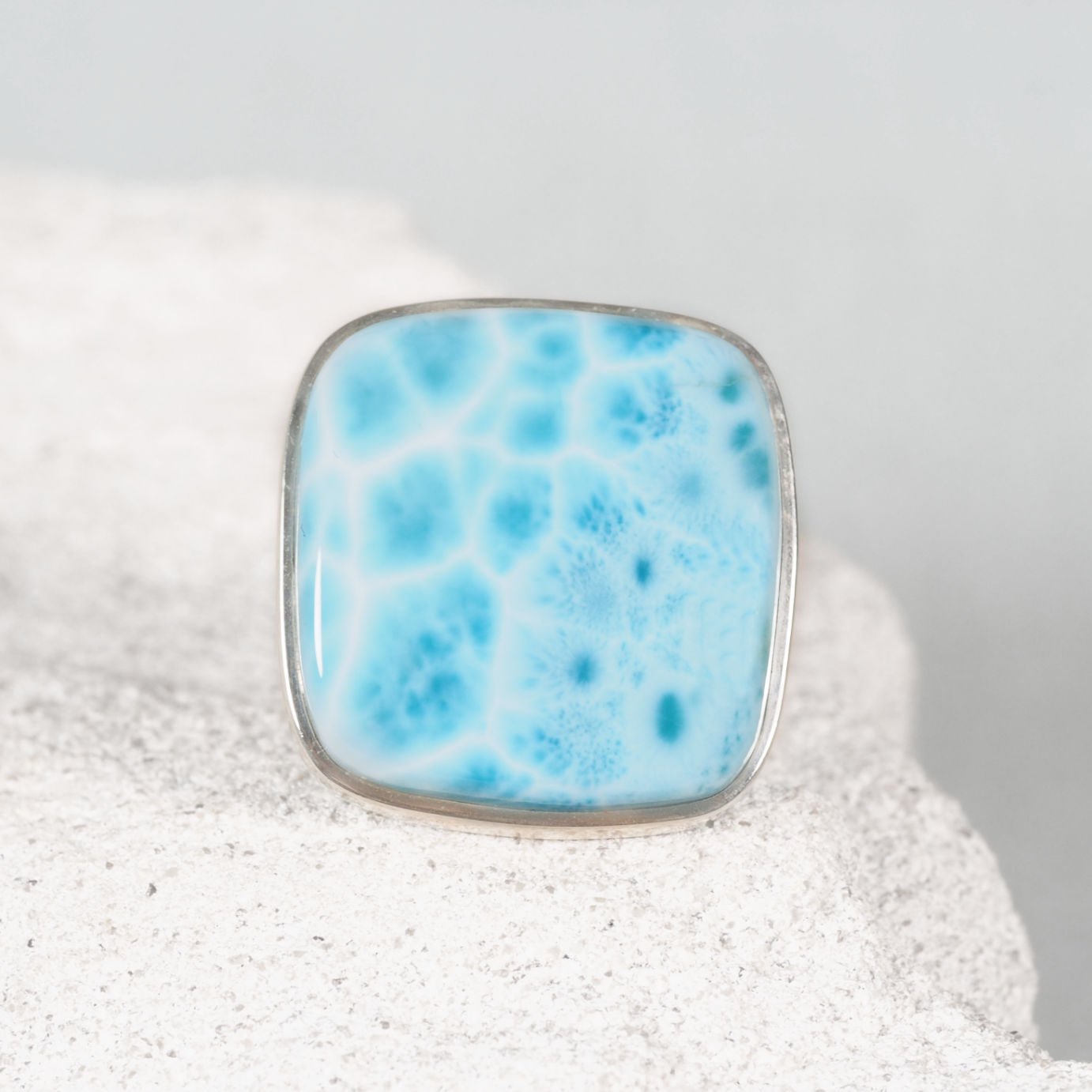 'Elara' Larimar Silver ring displaying a square cabochon gemstone