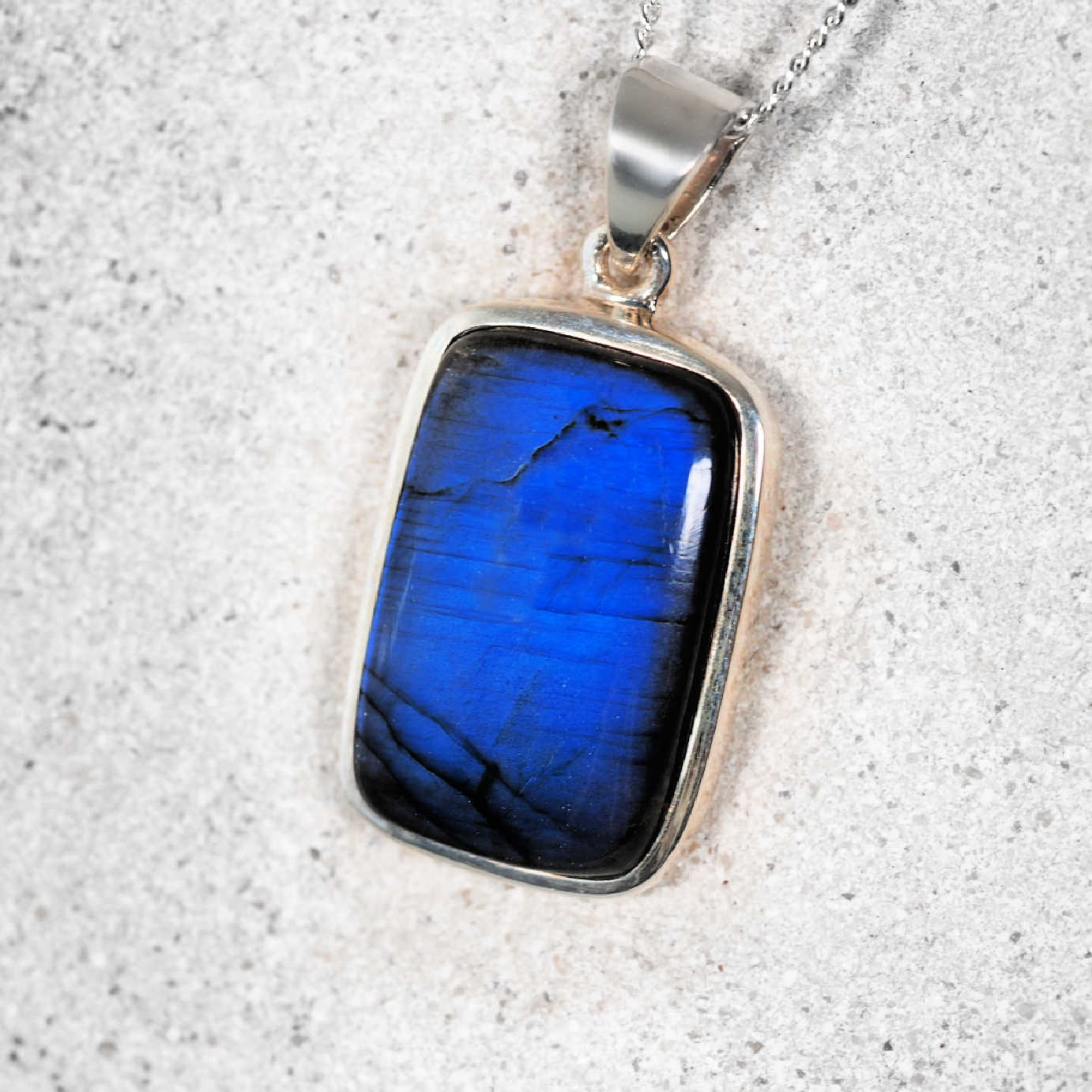 'Eleanor' Labradorite Gemstone Pendant set in silver bezel setting with bright yet deep blue hues