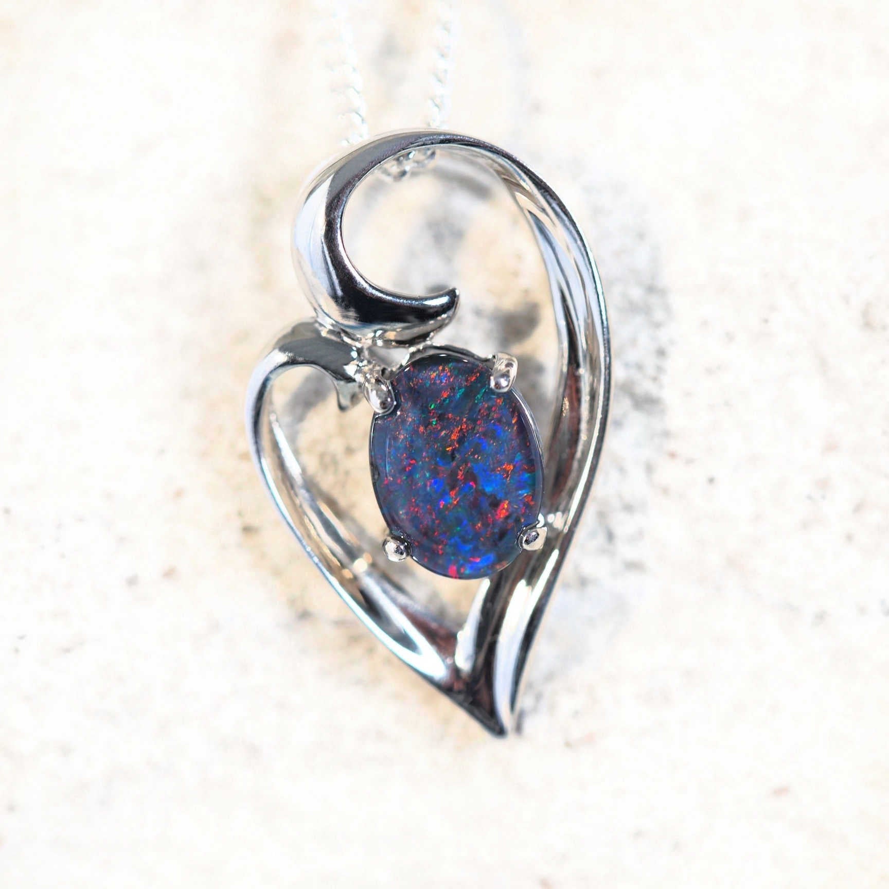triplet opal pendant set in silver
