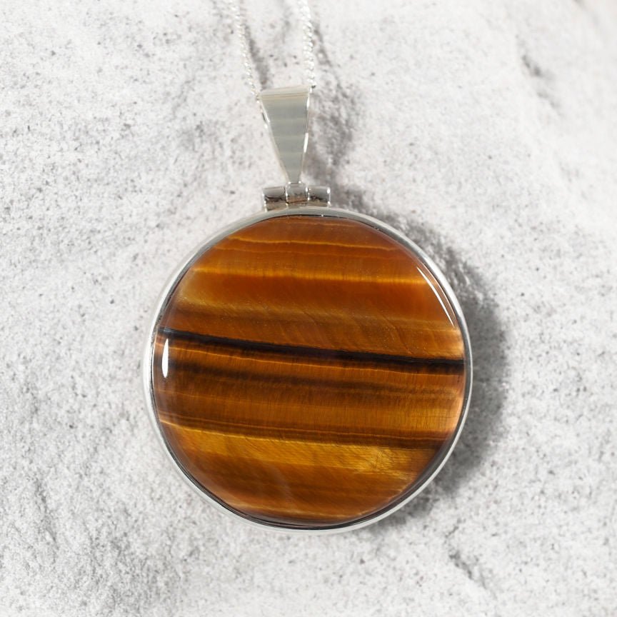 'Enid' Tiger’s Eye Pendant with round cabochon gemstone set in sterling silver