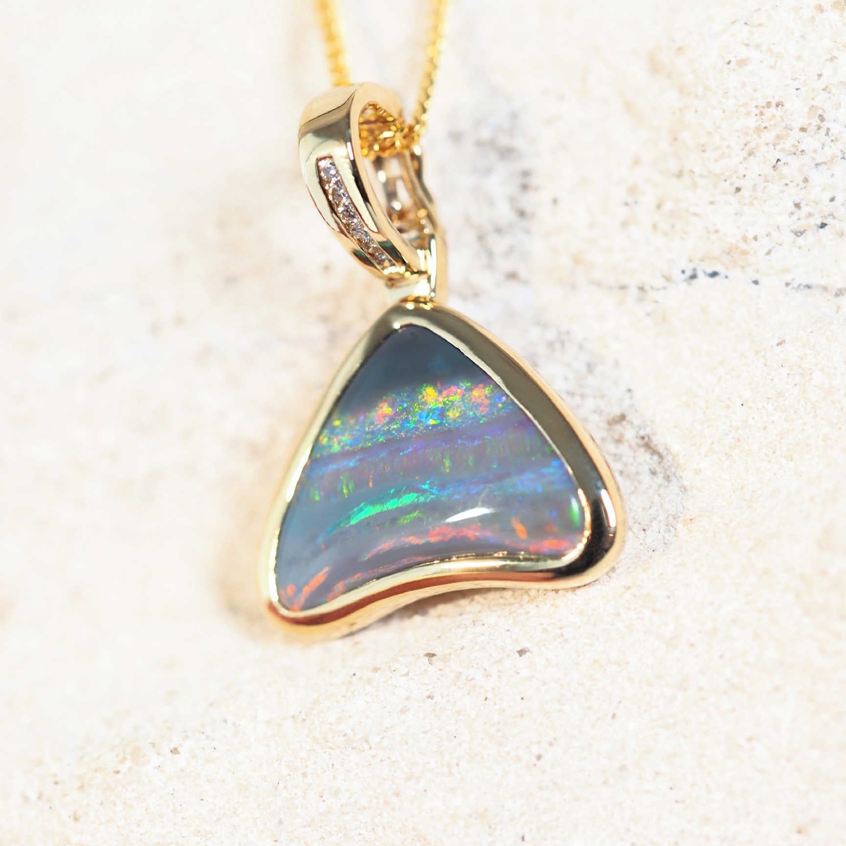 black crystal opal and diamond pendant