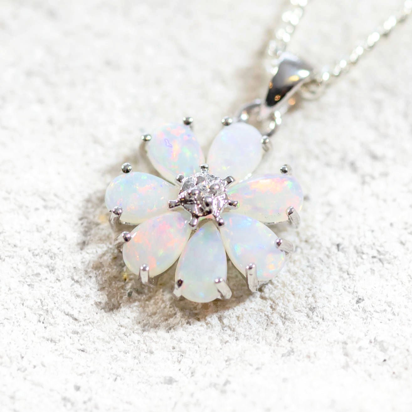 silver floral pendant set in sterling silver