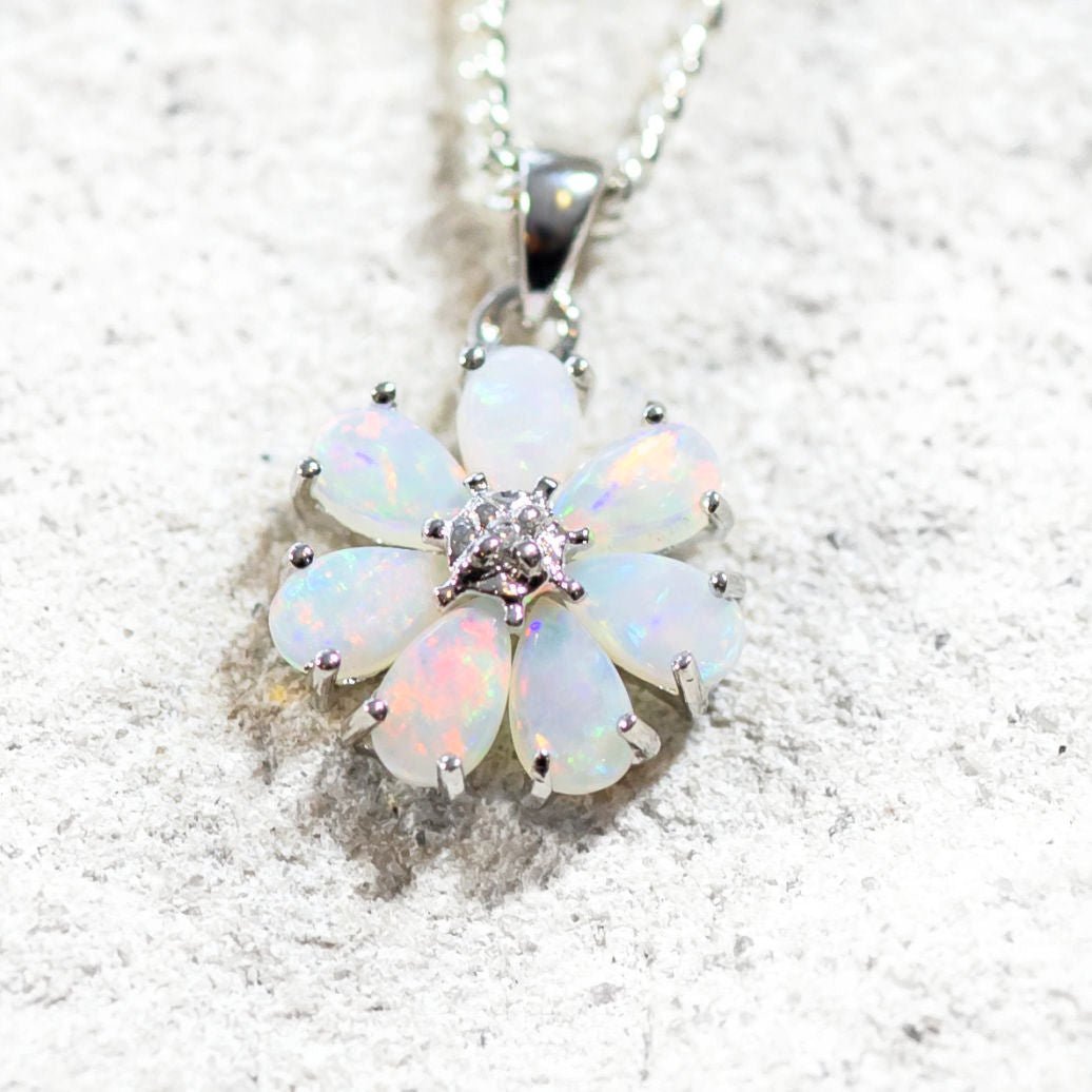 colourful teardrop opal pendant in a floral design