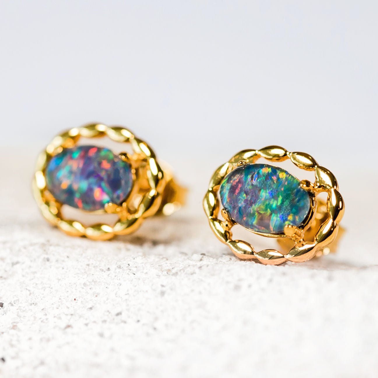 oval decorative opal stud earrings