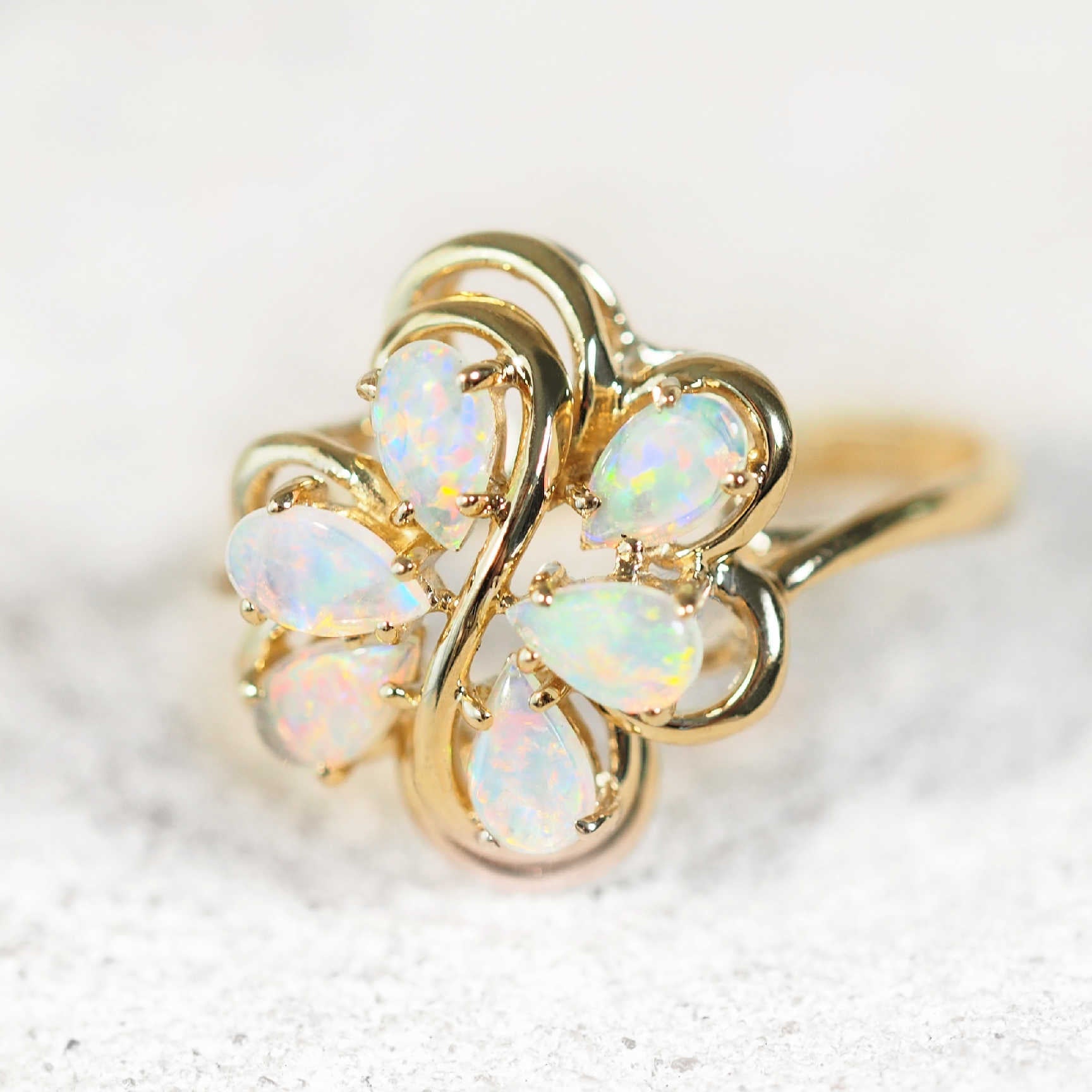 ornate crystal opal ring set in 14ct yellow gold