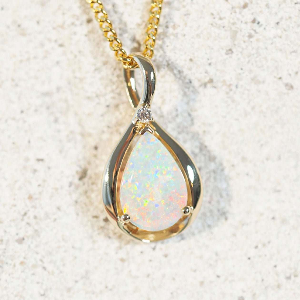 australian opal pendant set in 14ct gold