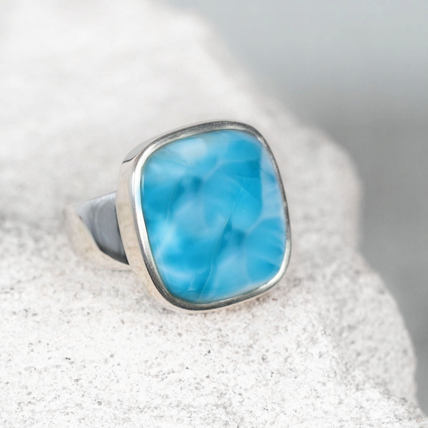 The 'Katie' Larimar Silver Ring displaying a genuine blue with marbling white gemstone