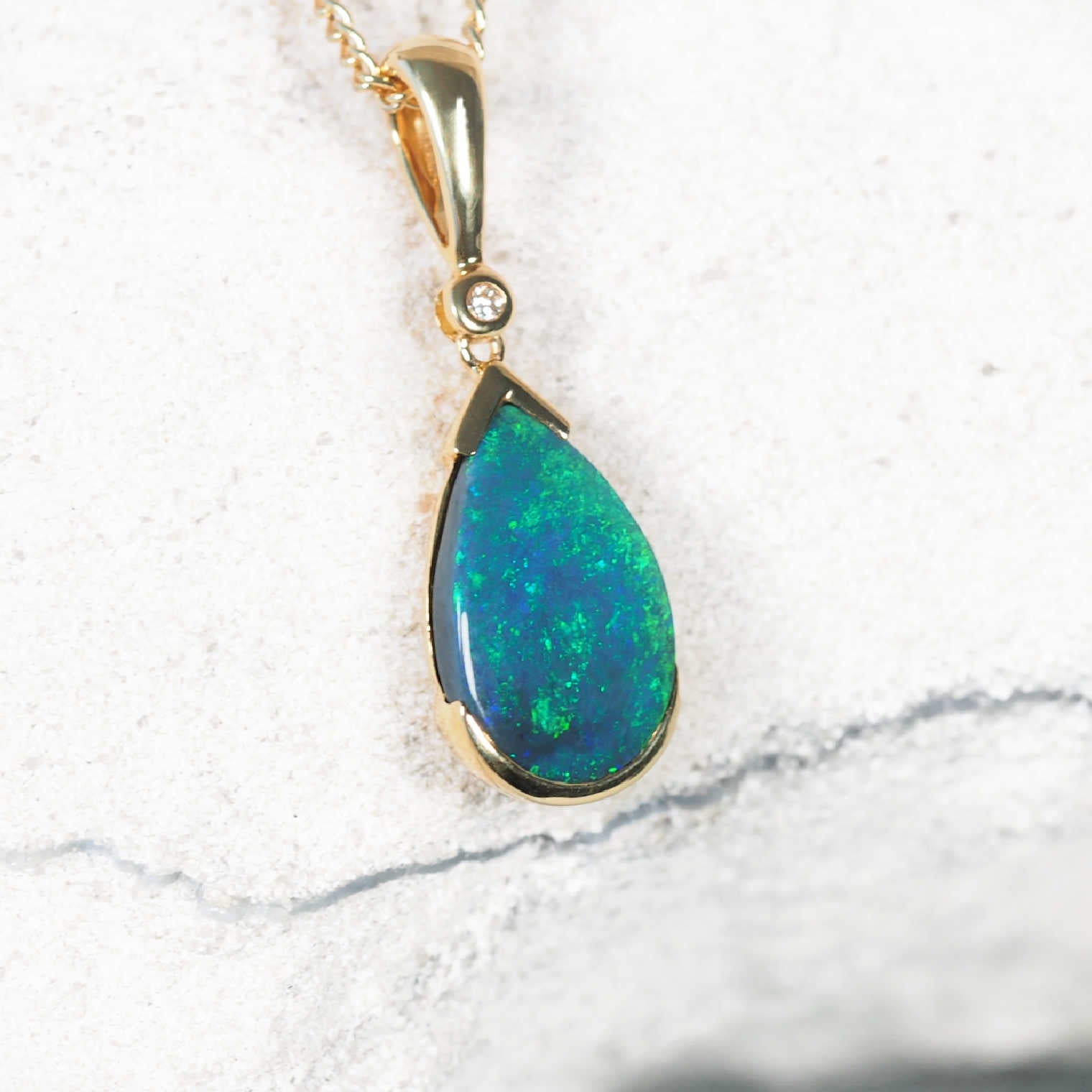 Handcrafted 18ct yellow gold black opal necklace with natural Lightning Ridge opal