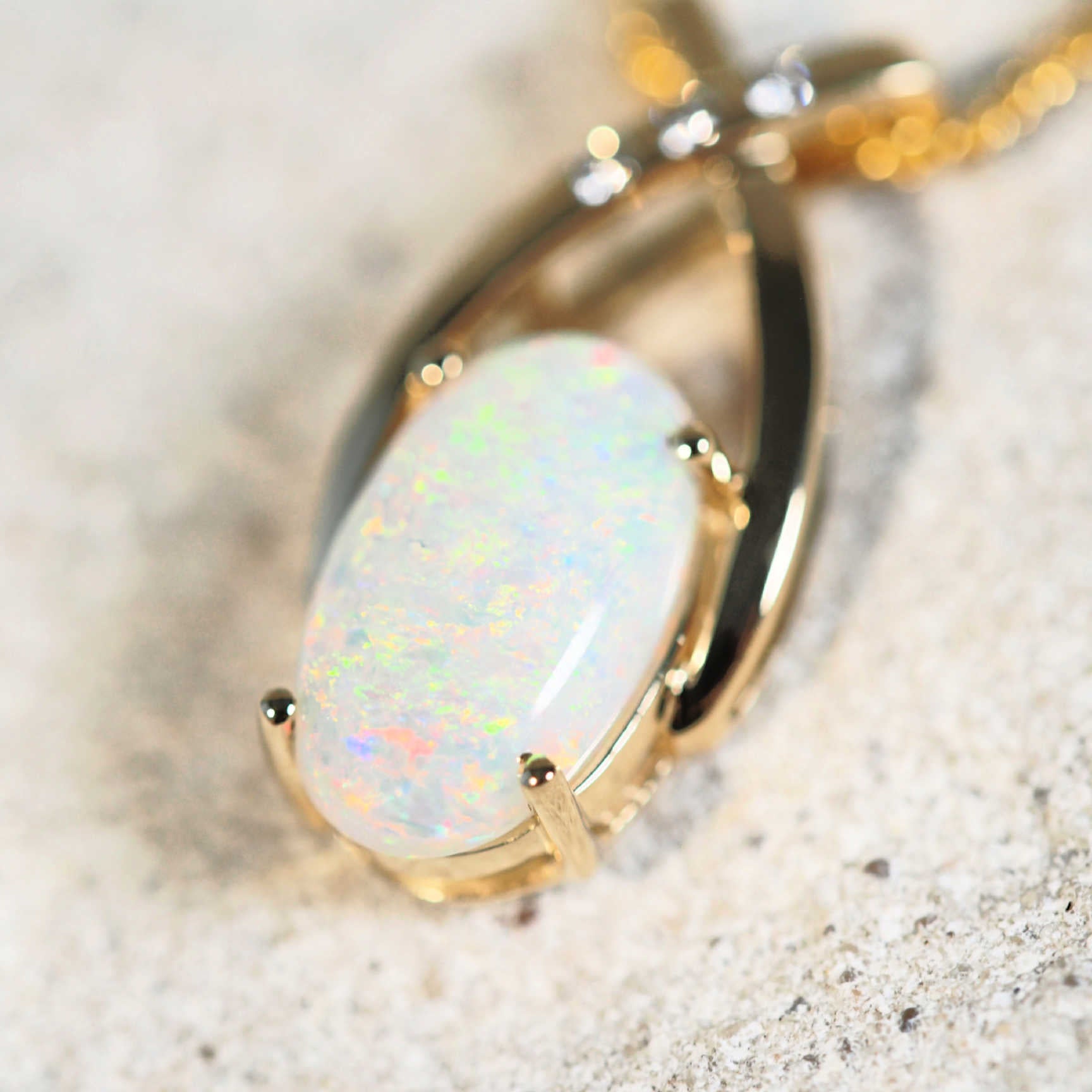 colourful crystal opal gold pendant