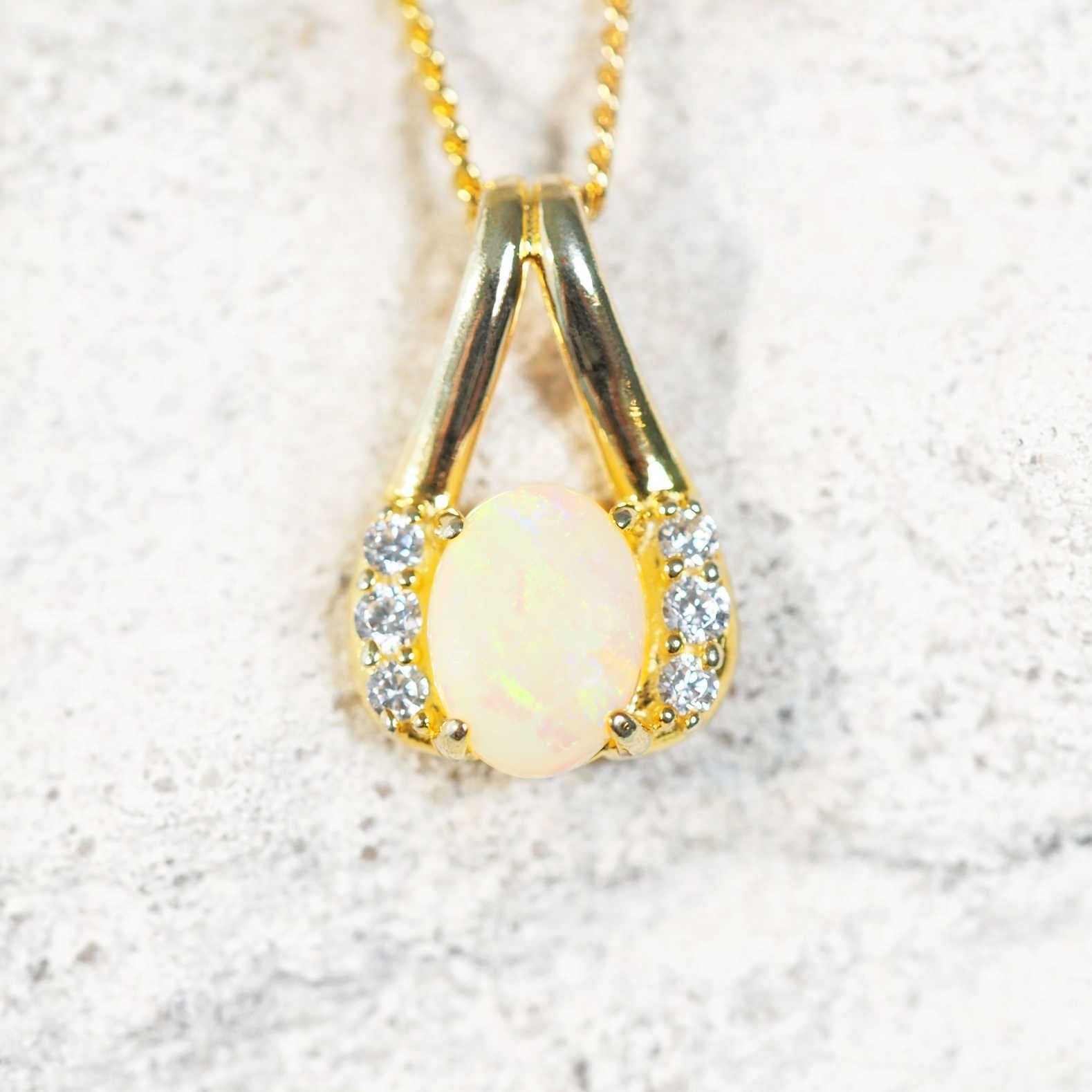 white opal gold plated silver pendant