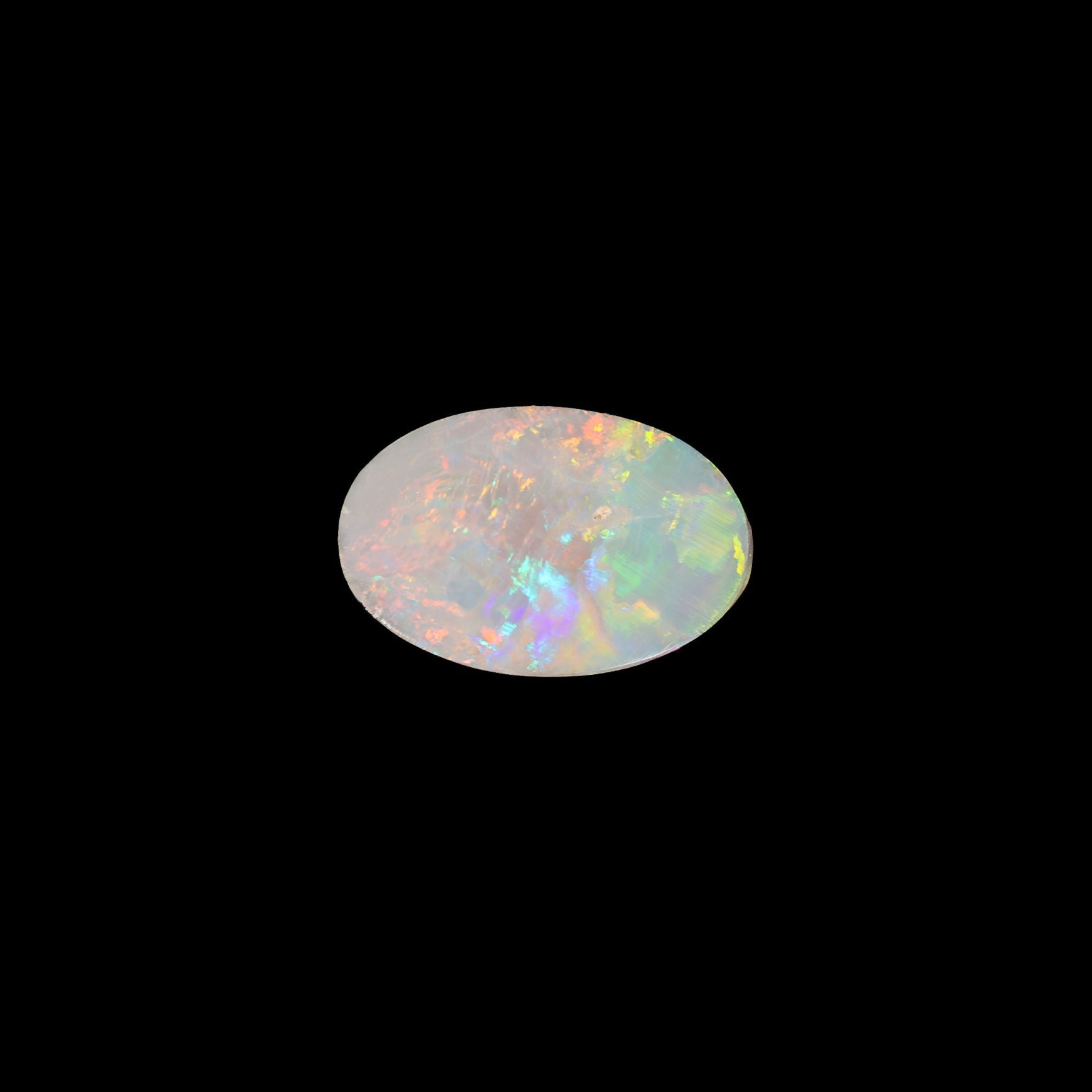 Ethically mined Liora crystal opal, oval-shaped with radiant flashes of colour, from Lightning Ridge, Australia