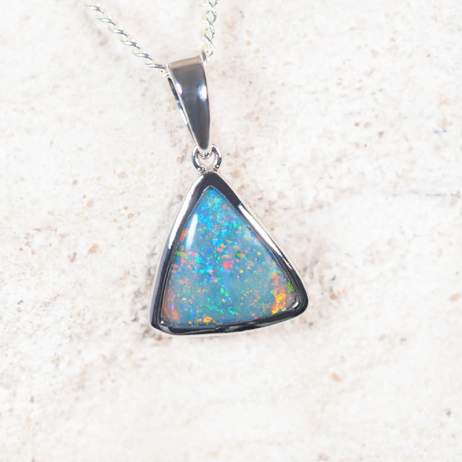 Elegant Australian black opal pendant with bezel-set Lightning Ridge opal and diamonds – ‘Lumira’ by Black Star Opal