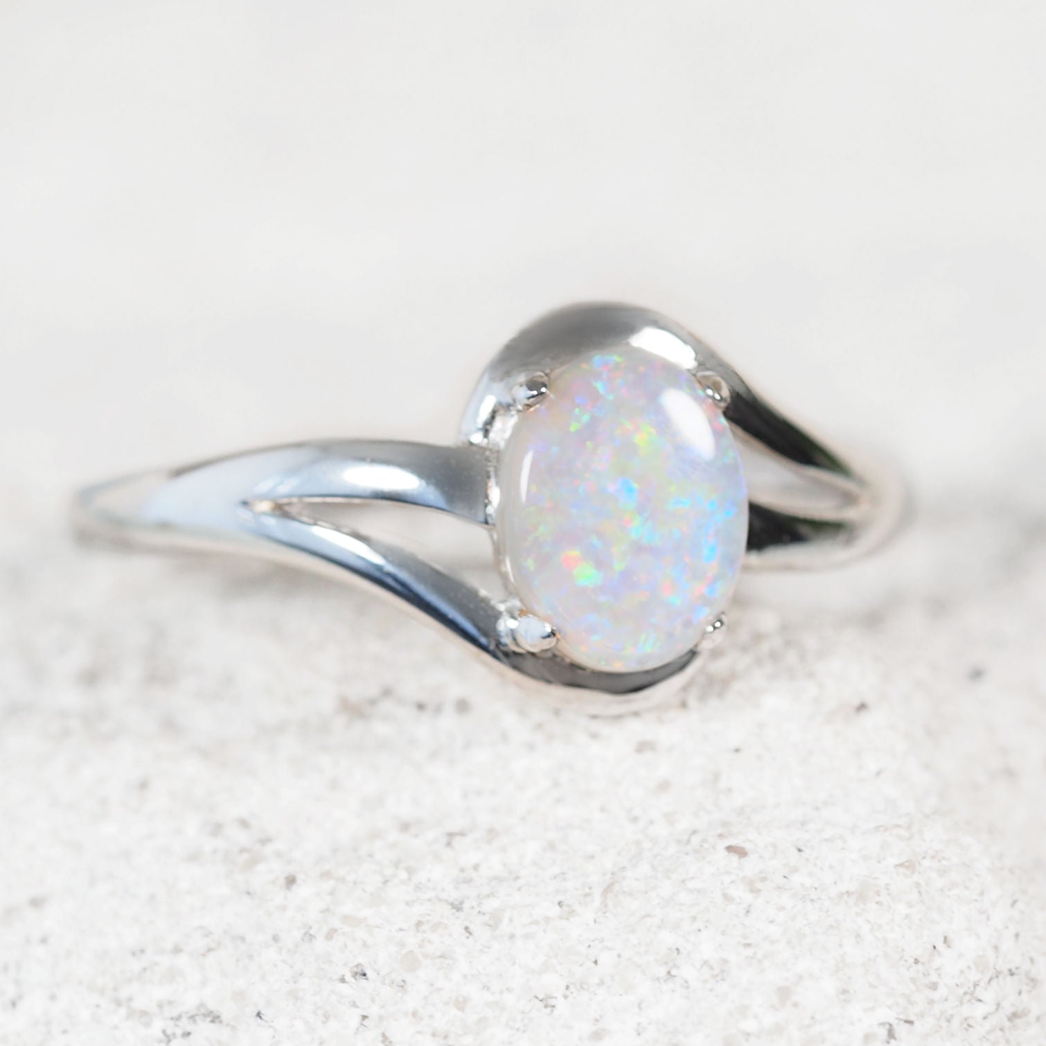 White opal ring set in sterling silver