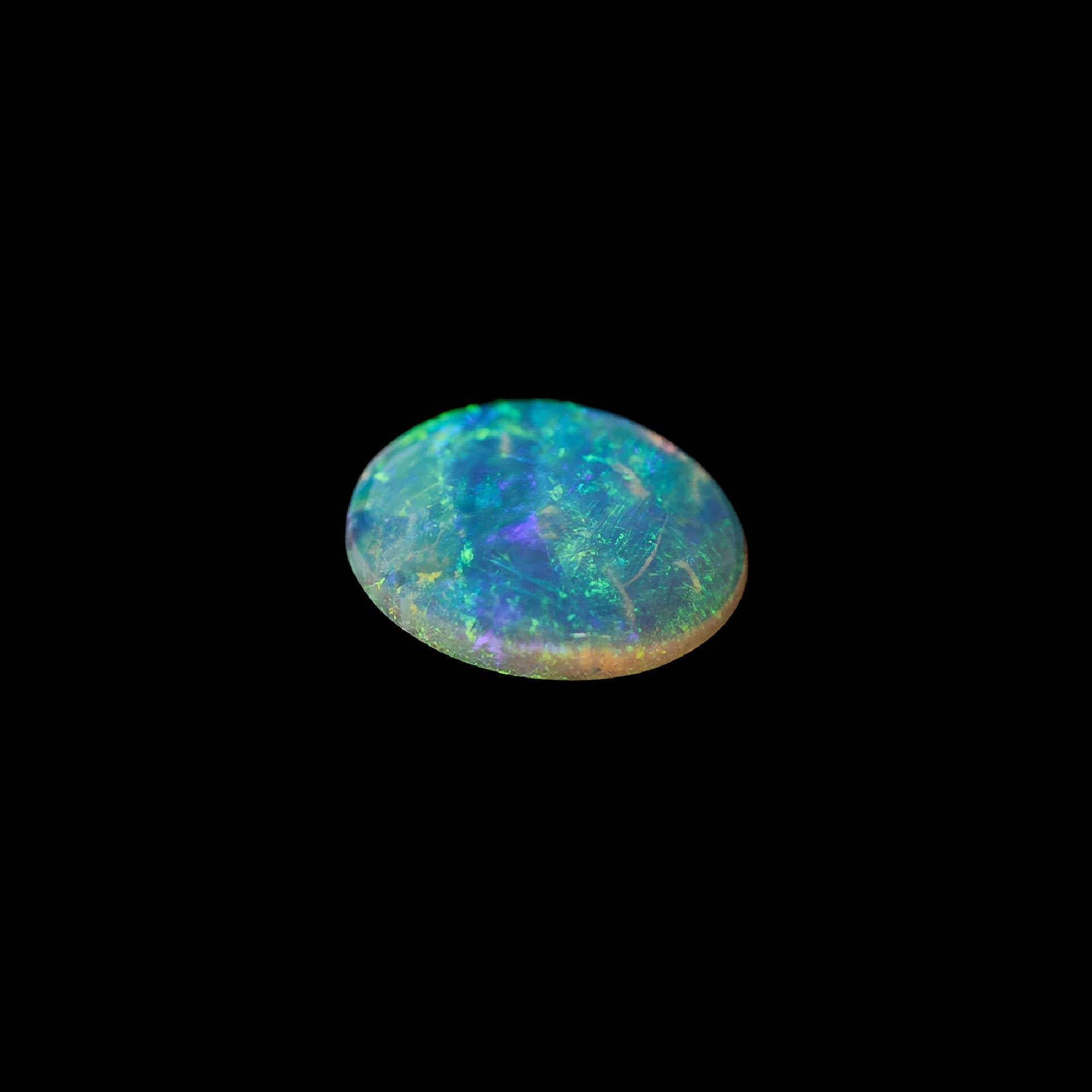 Australian crystal Opal stone on a black background