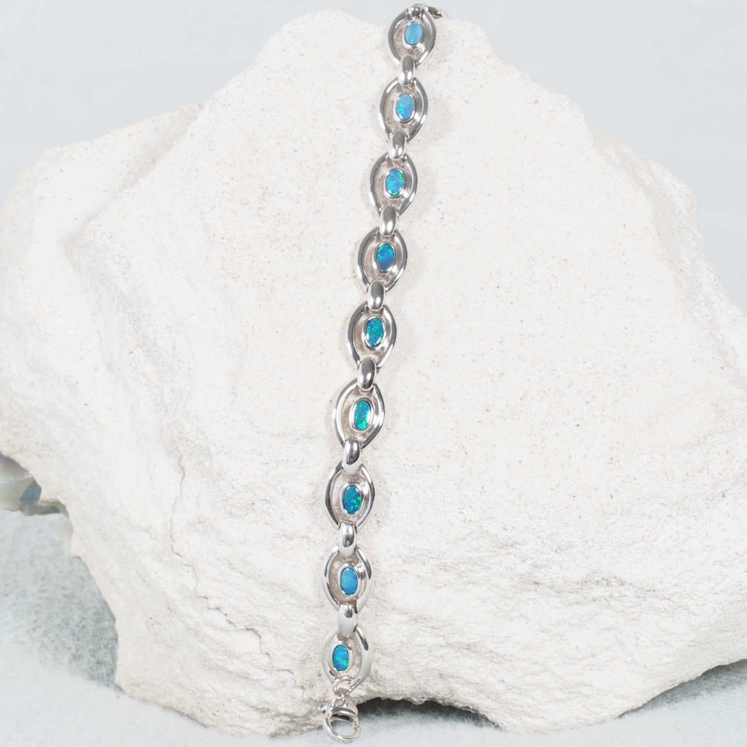 Elegant opal bracelet with sterling silver setting and vibrant Australian opals