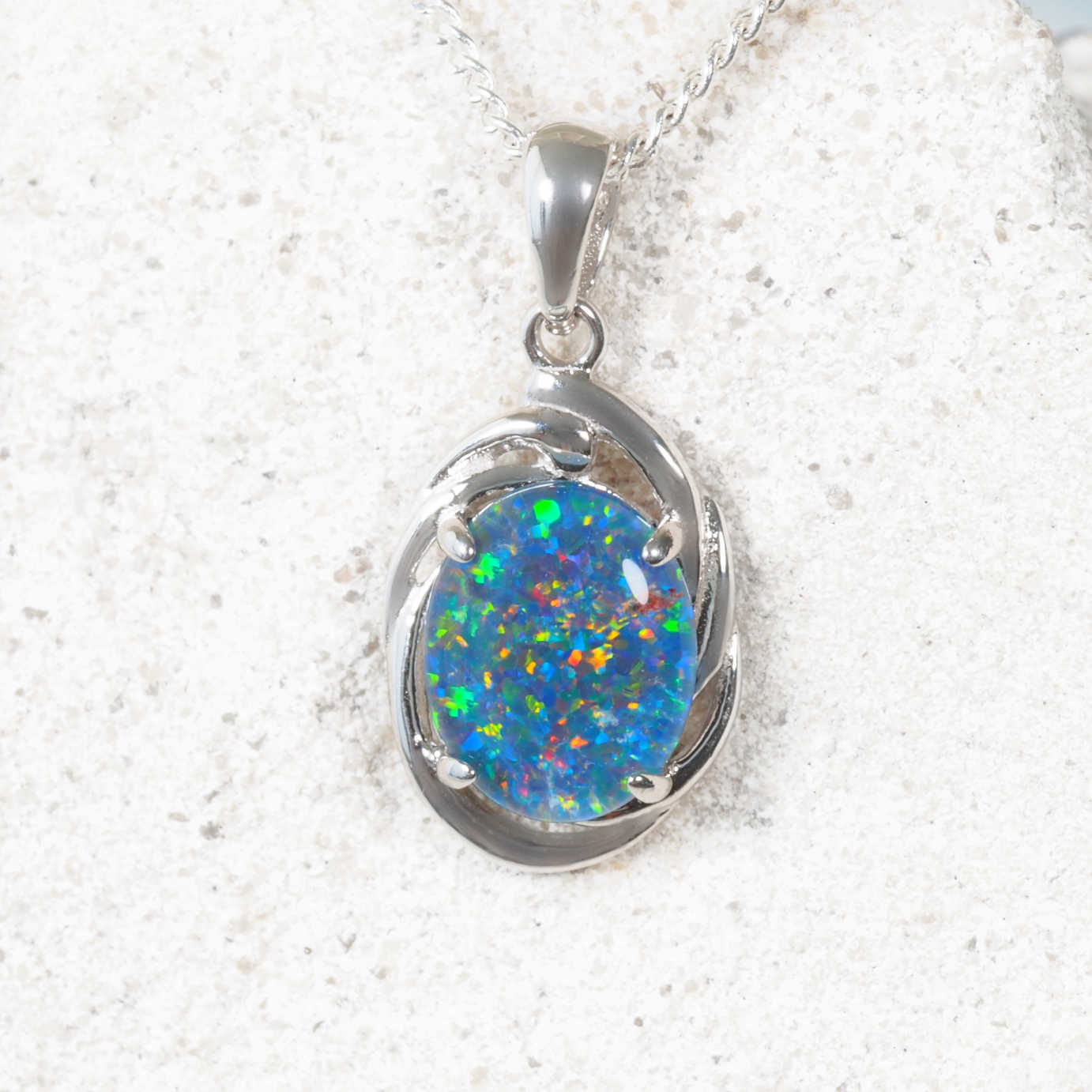 Modern silver opal necklace featuring oval Australian triplet opal