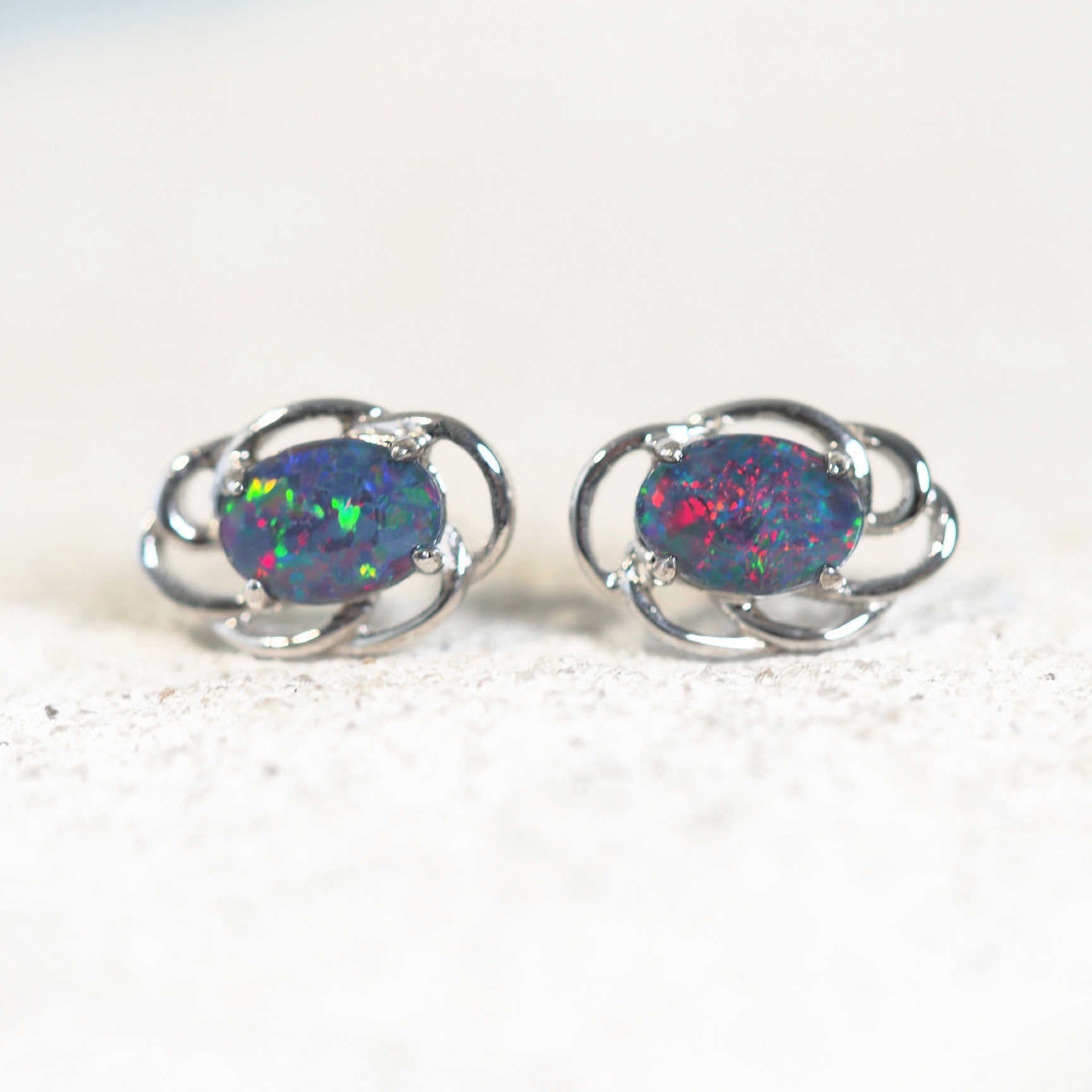 colourful oval earrings with a whorl pattern