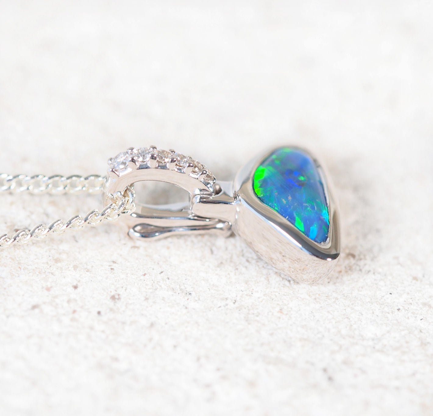 Luxury black opal necklace with enhancer clasp and six sparkling diamonds
