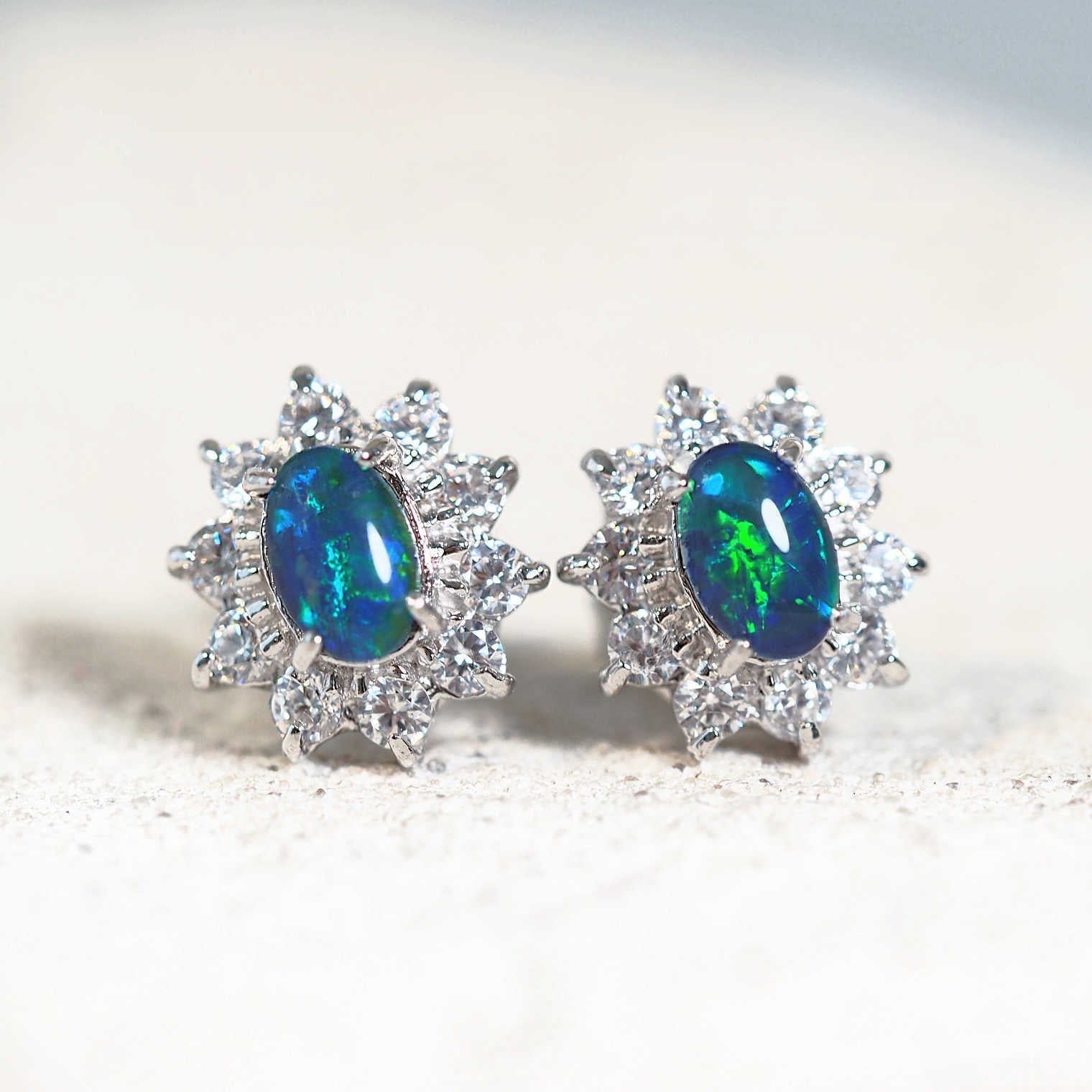 blue and green princess design opal stud earrings