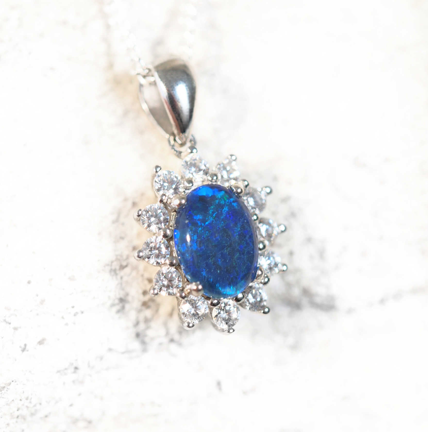 blue opal pendant set in sterling silver