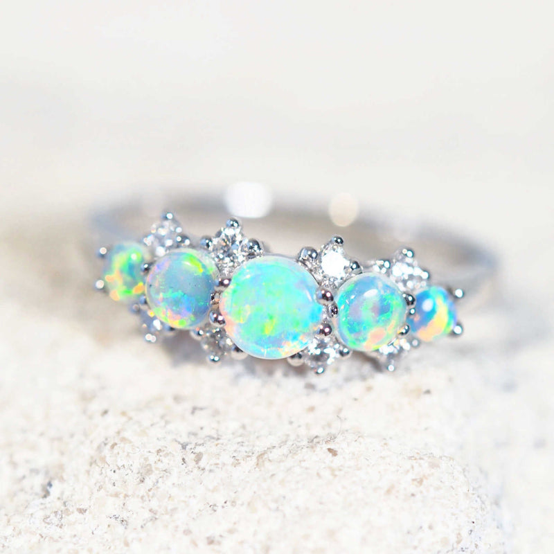 opal engagement ring set with a green natural australian crystal opal