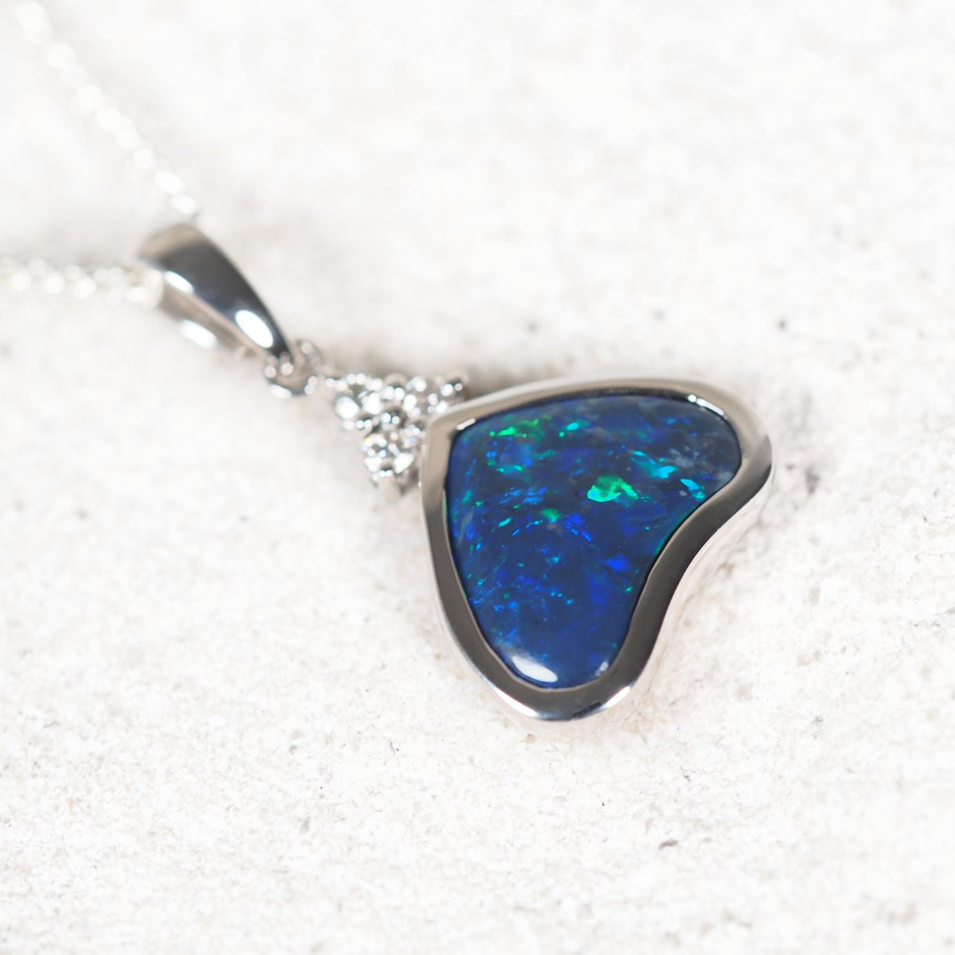 Luxury black opal and diamond necklace – handcrafted 18ct white gold pendant featuring genuine Australian opal
