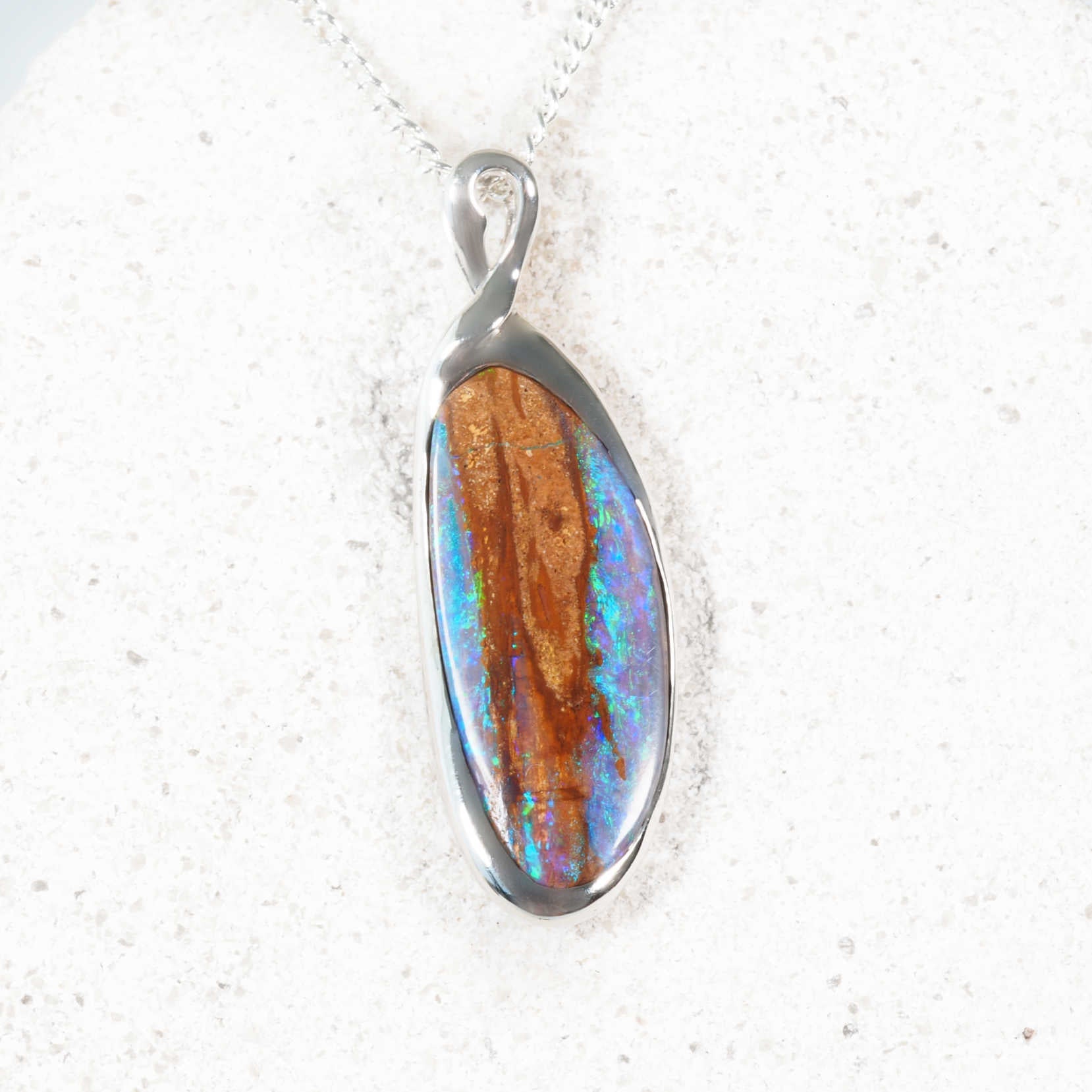 ‘Shea’ sterling silver boulder opal pendant featuring blue-green Queensland opal