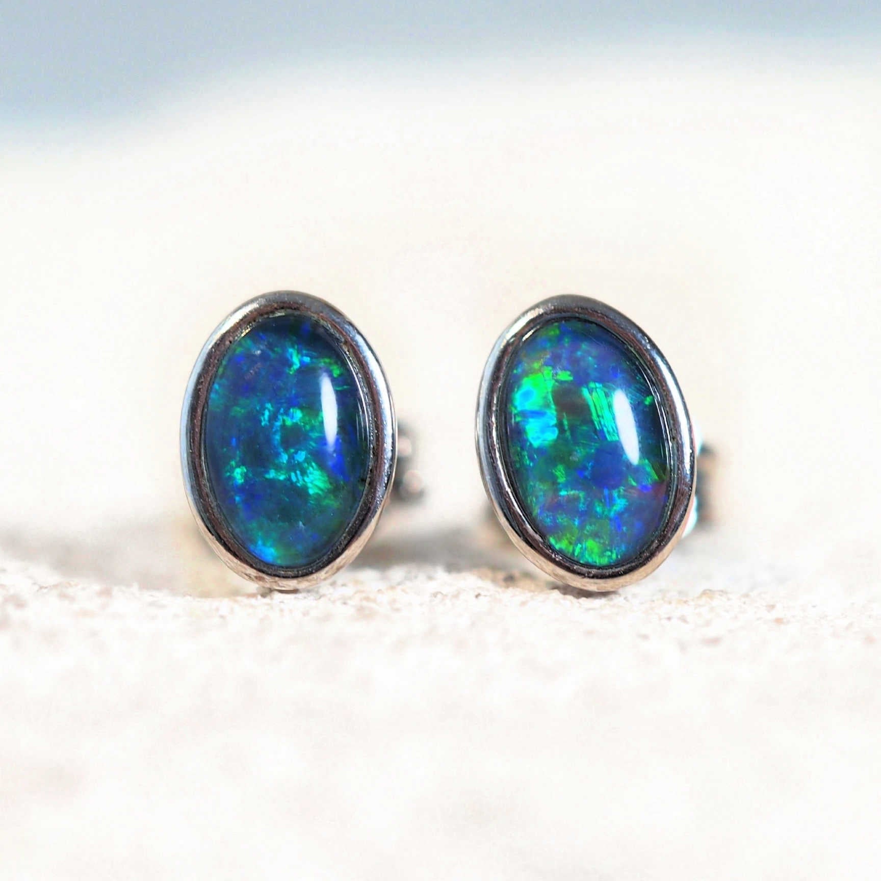 silver triplet opal earrings