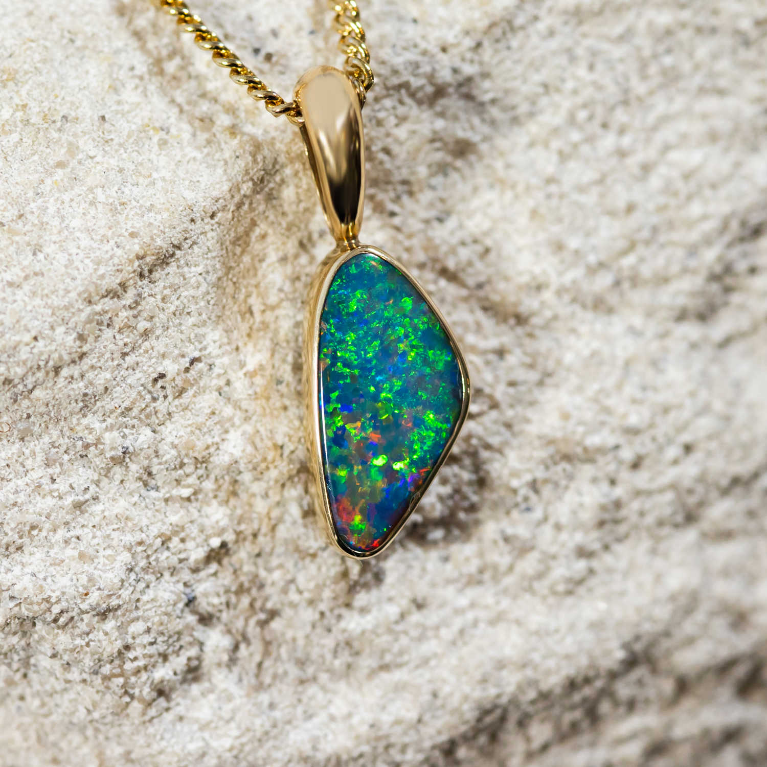 Gold doublet opal pendant