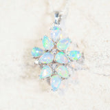crystal opal pendant set in white gold