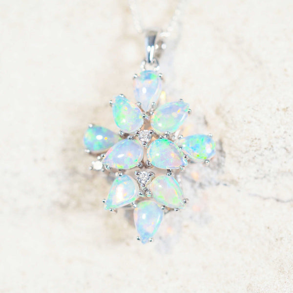 crystal opal pendant set in white gold