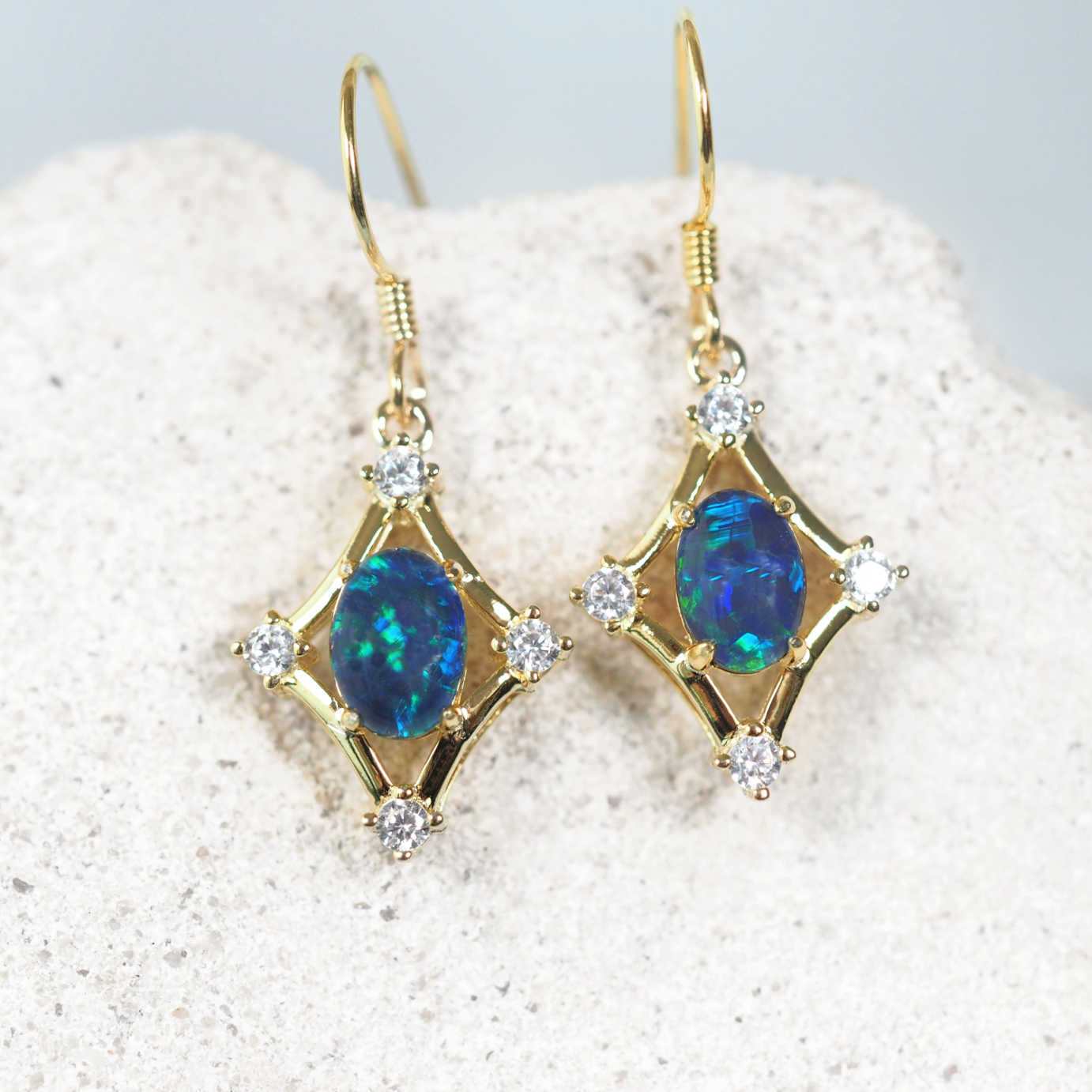 Venette Blue opal drop earrings with oval Australian triplet opals in blue and green tones.