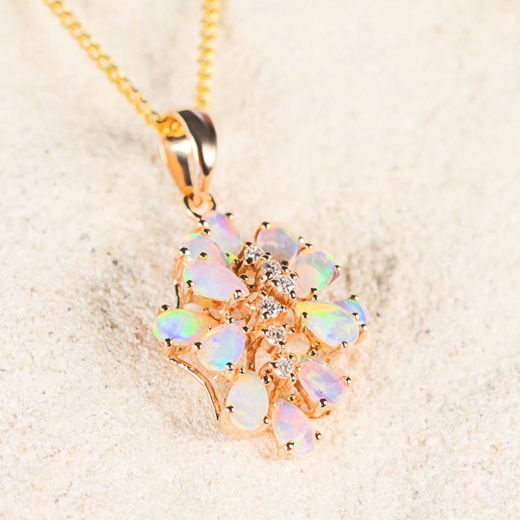 crystal opal pendant in gold