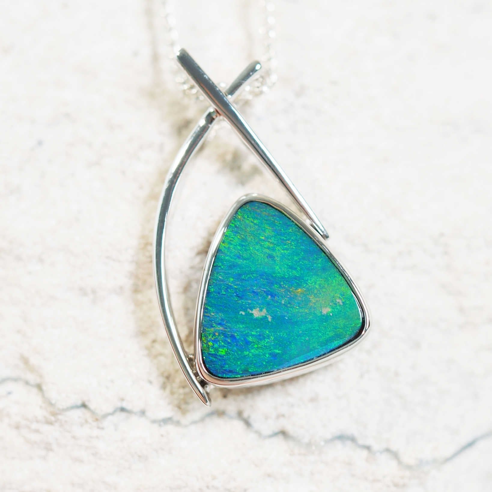 green doublet opal pendant set in sterling silver