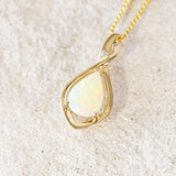 multi-colour white opal from coober pedy set into a gold pendant