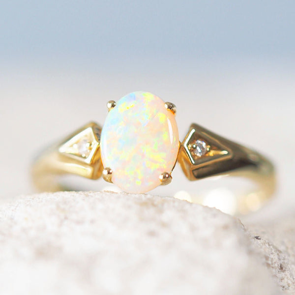 multi-colour oval crystal opal gold ring set with a solid Australian opal from Coober Pedy
