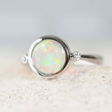 colourful crystal opal white gold ring with two diamonds